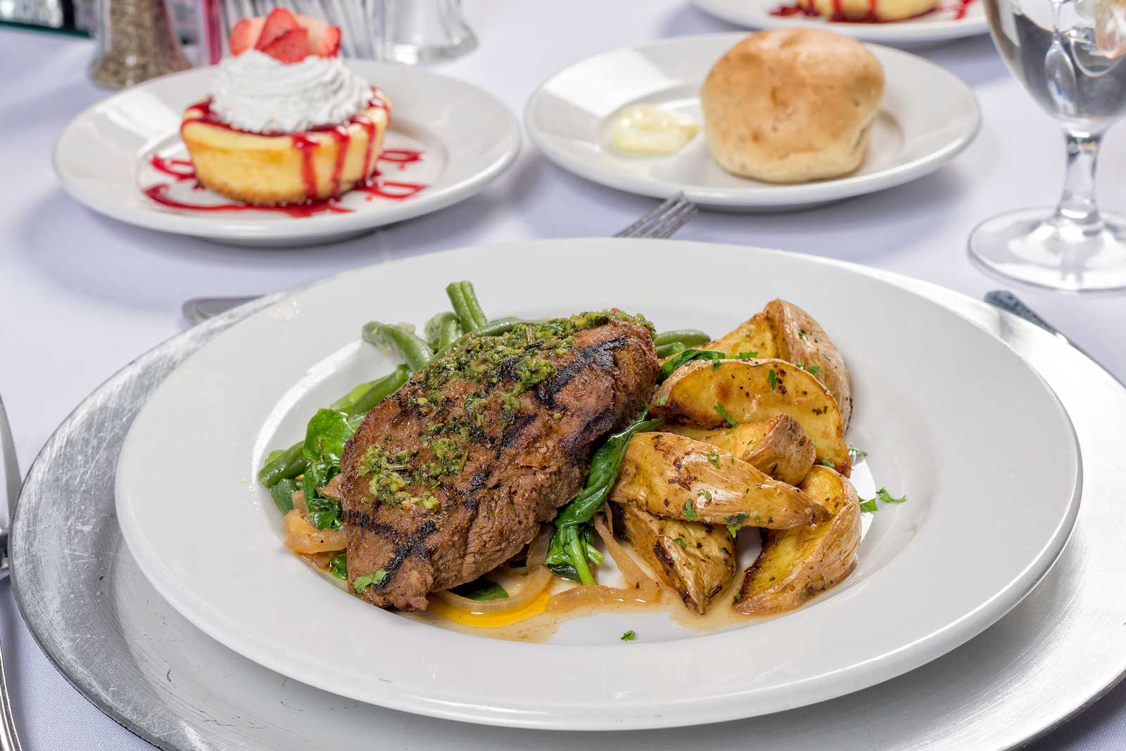 Catering by Norris delivers amazing meals for parties, weddings, dinners and all social occasions, New York Strip with green beans and wedge potatoes